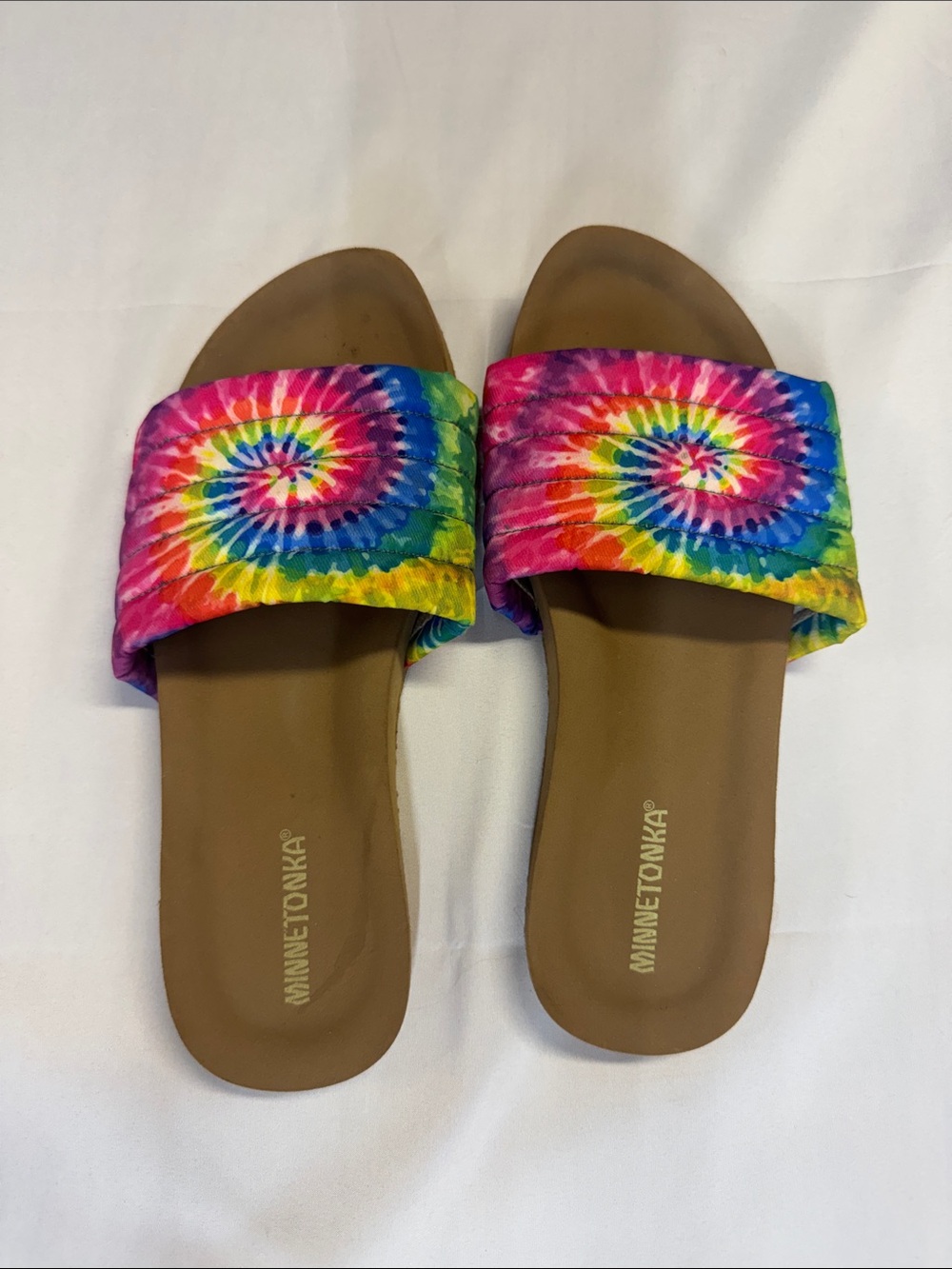 Minnetonka Tie-Dye Slide Sandals in Pink, Blue, Yellow, Green